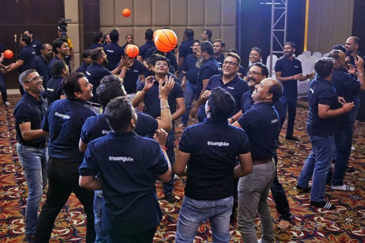 Several balls in play above the crowd at once